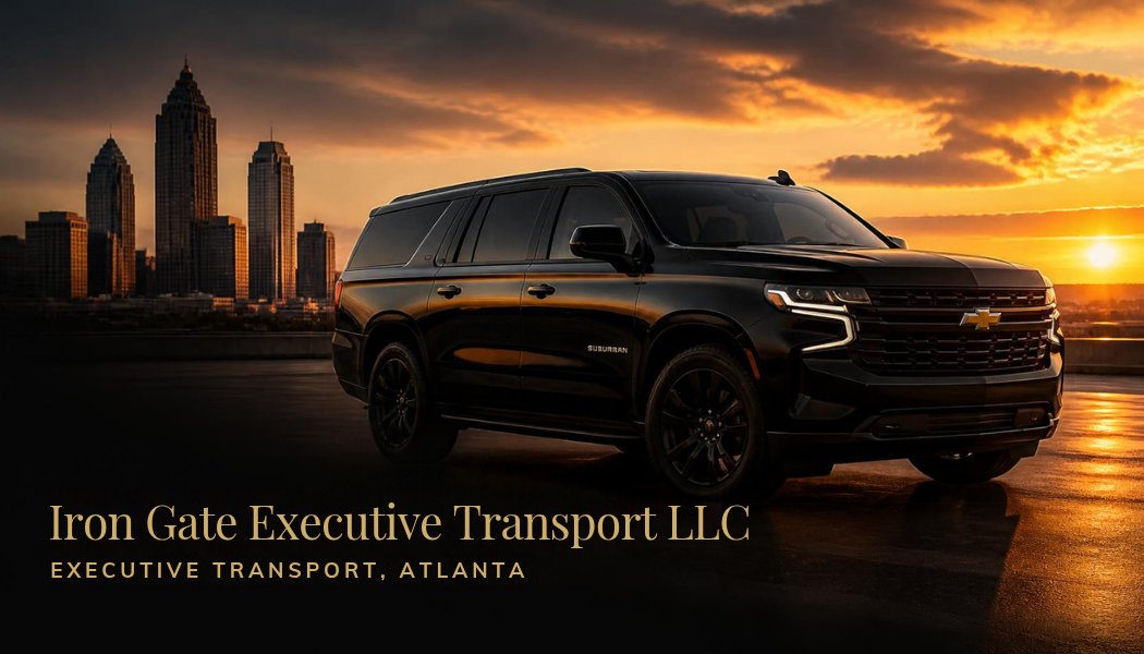 Black Chevy Suburban at sunset with the Atlanta skyline – Iron Gate Executive Transport